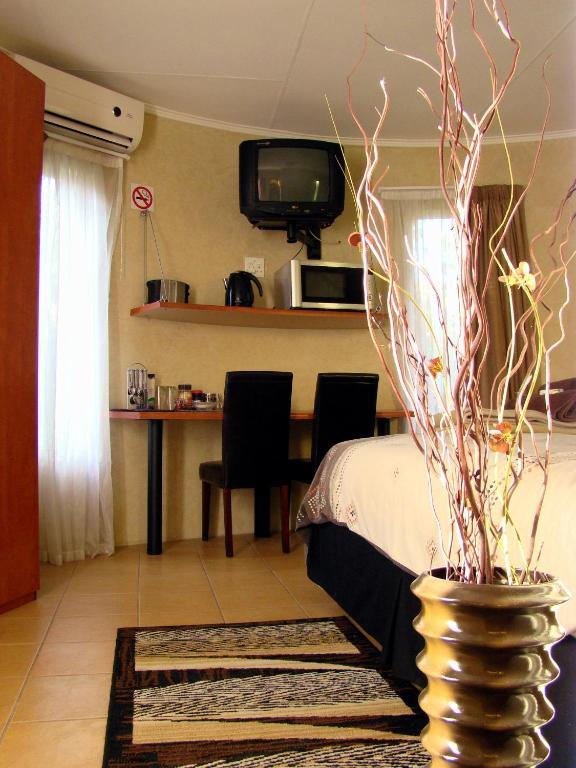 Eagle Crest Executive Lodge Edenvale Quarto foto