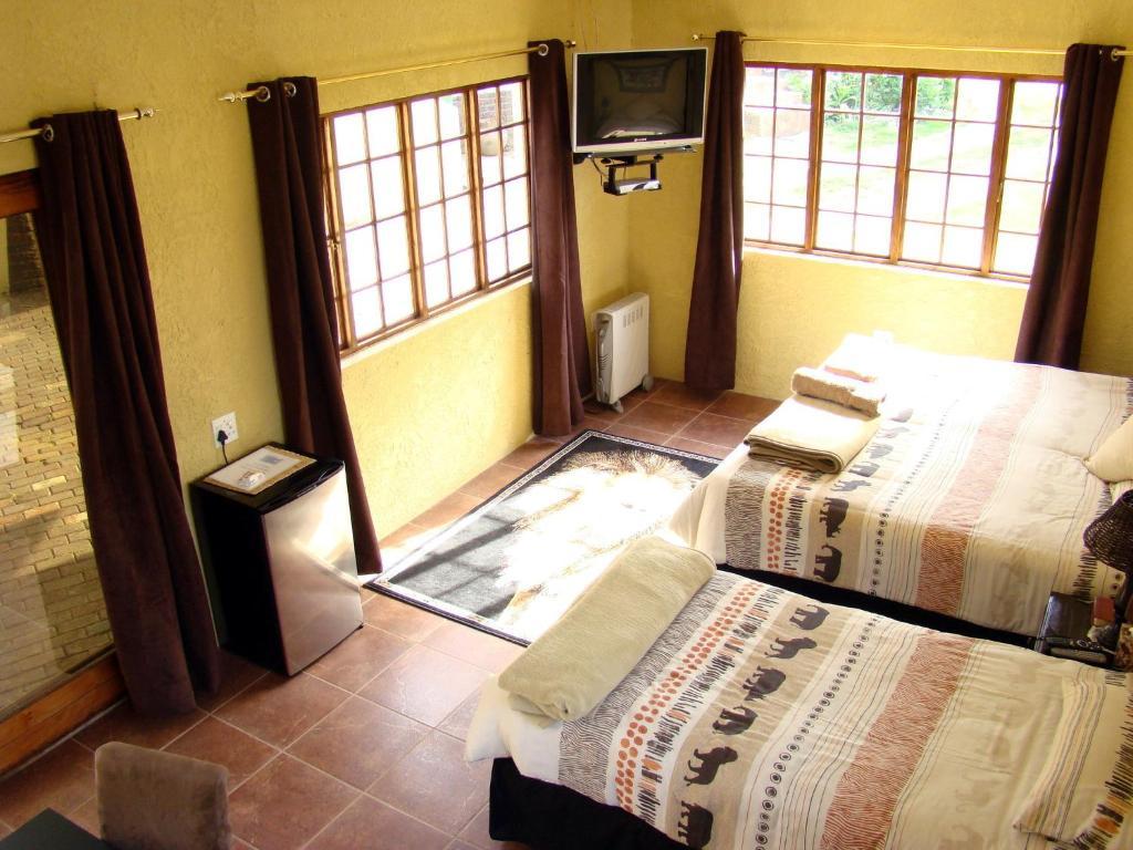 Eagle Crest Executive Lodge Edenvale Quarto foto